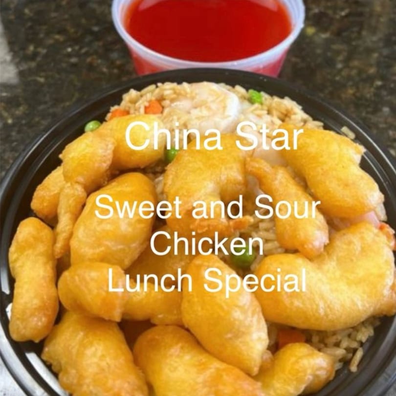 China Star's sweet and sour chicken lunch special with fried rice and a side of red sauce.